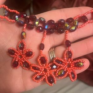 NWT womens red and iridescent flower necklace